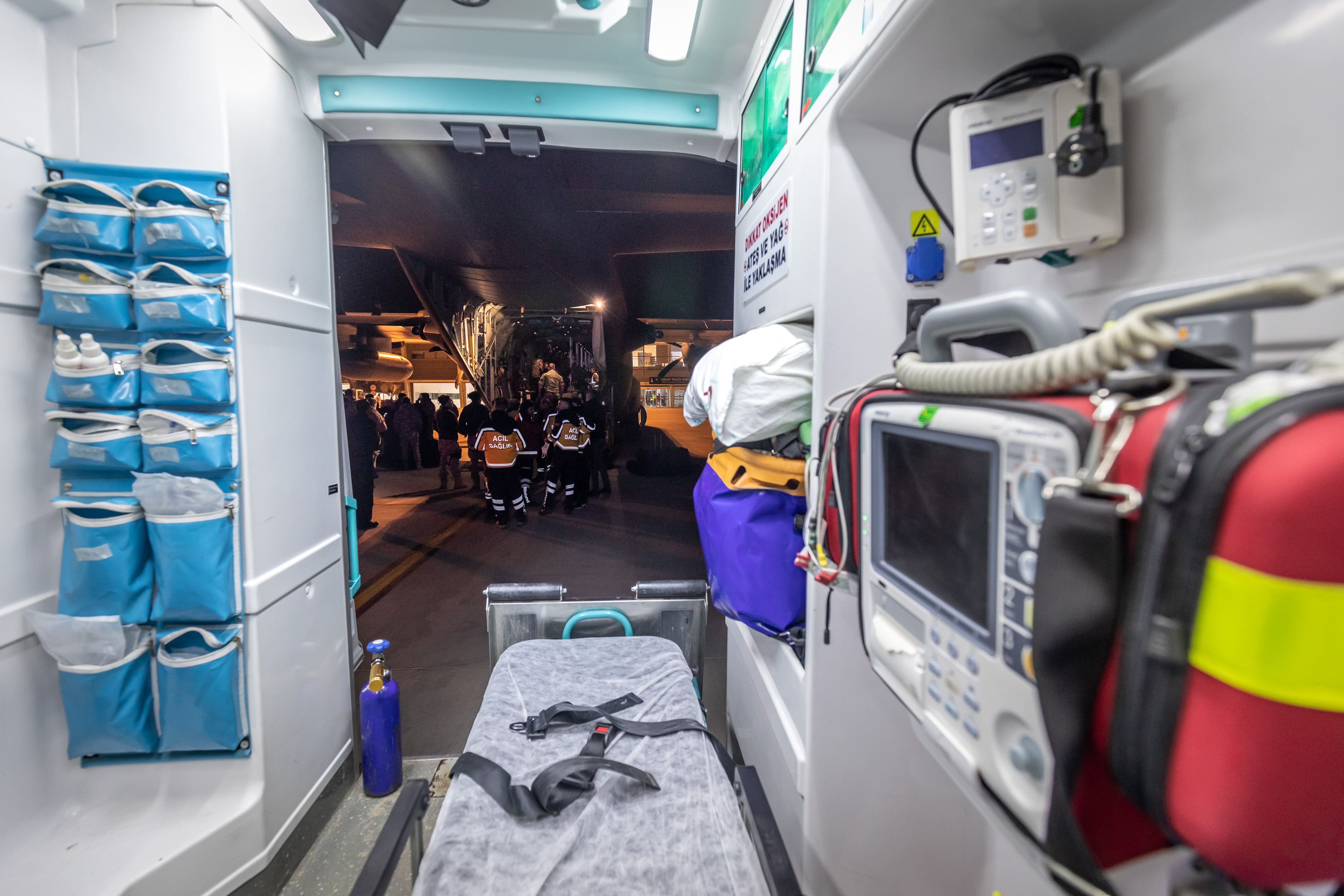 Image shows medical equipment inside an ambulance.es aircraft.